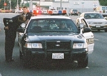 An El Segundo Police Car and officers facing north on Sepulveda Blvd. in front of the Ralphs Grocery Store during the 141-day United Food and Commercial Workers (UFCW) Union Strike and Store Lockout in 2003-2004.